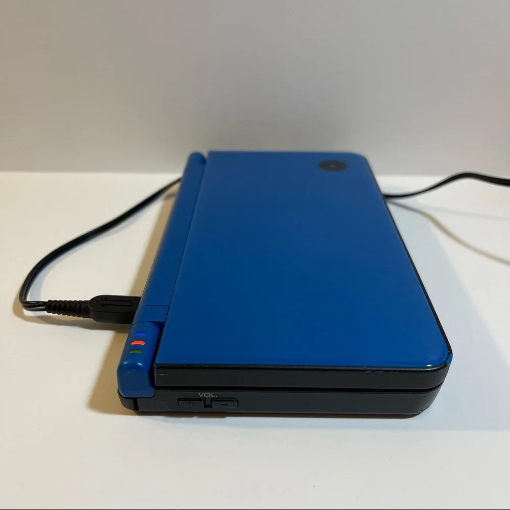 SOLD (1)Nintendo DSi XL Midnight Blue (1)NEW🔌 (1)NEW 32GB CARD (7)Games! - Picture 8 of 15